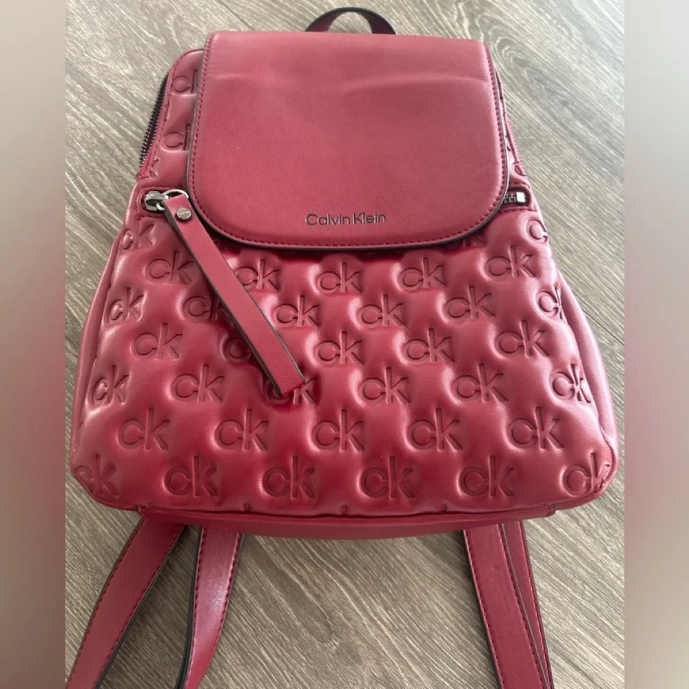 Calvin Klein Red Embossed Backpack - Picture 2 of 8